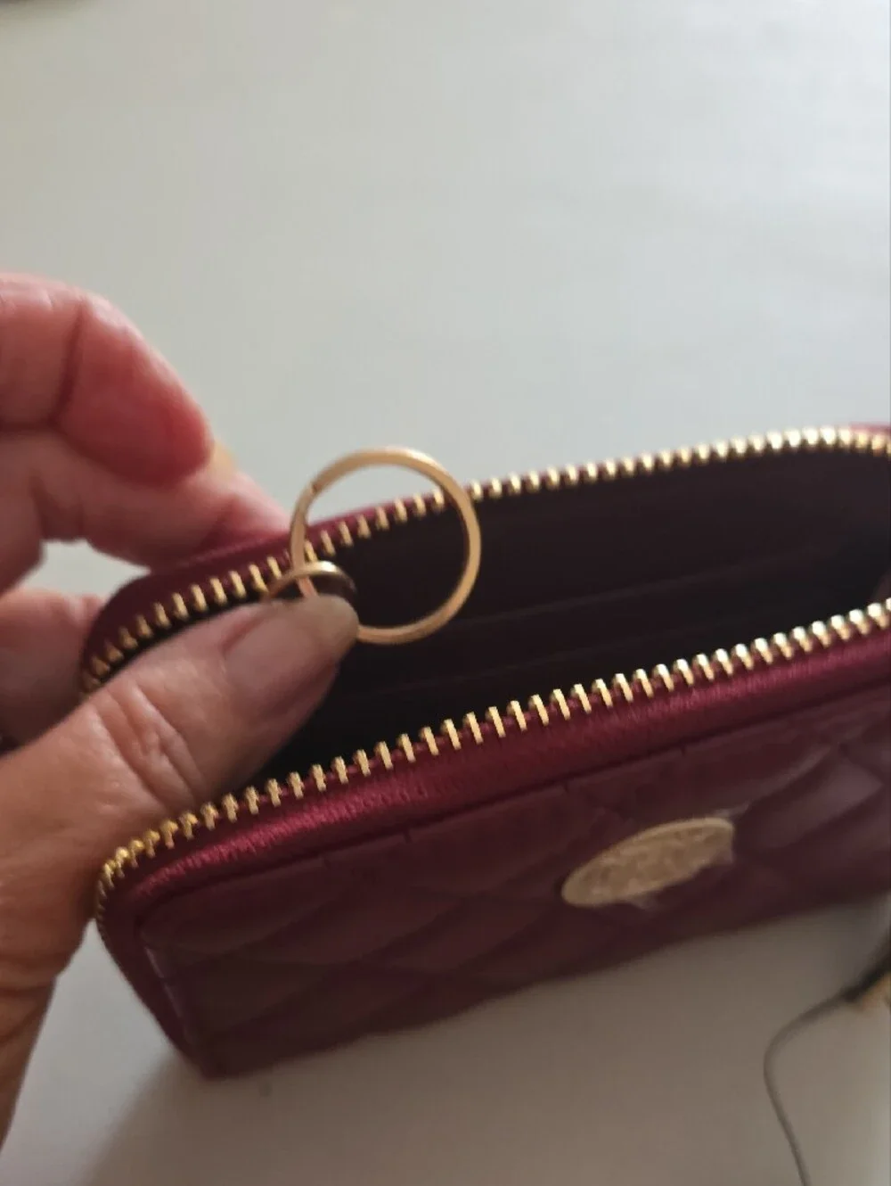 Badgley Mischka Quilted Wine Zip Card Wallet with Gold Logo